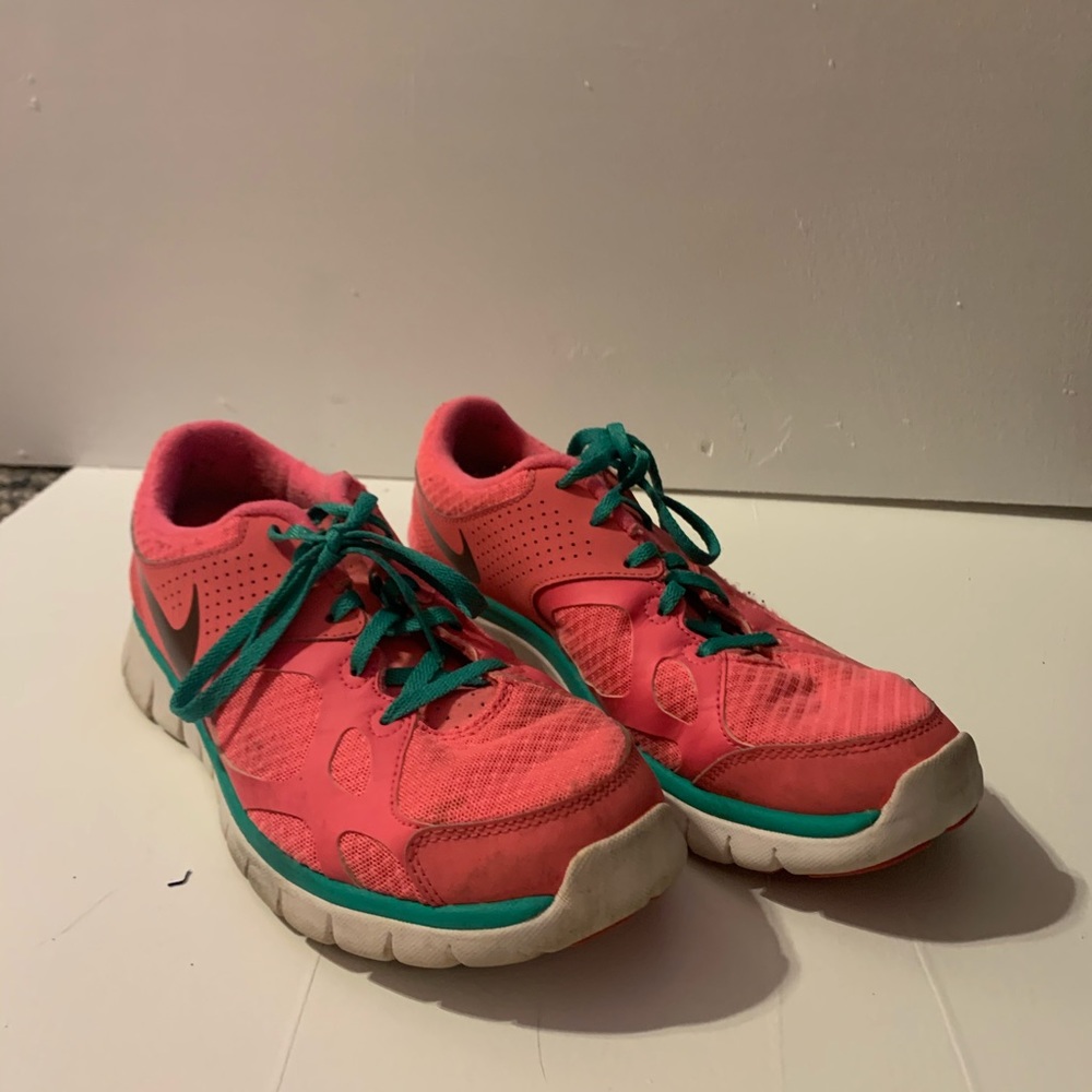 Pink and teal tennis shoes